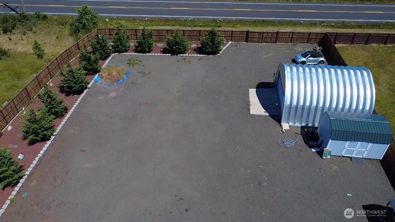 5922 184th Lane Southwest Rochester, WA 98579 - Photo 28 of 34 a view of swimming pool with outdoor seating