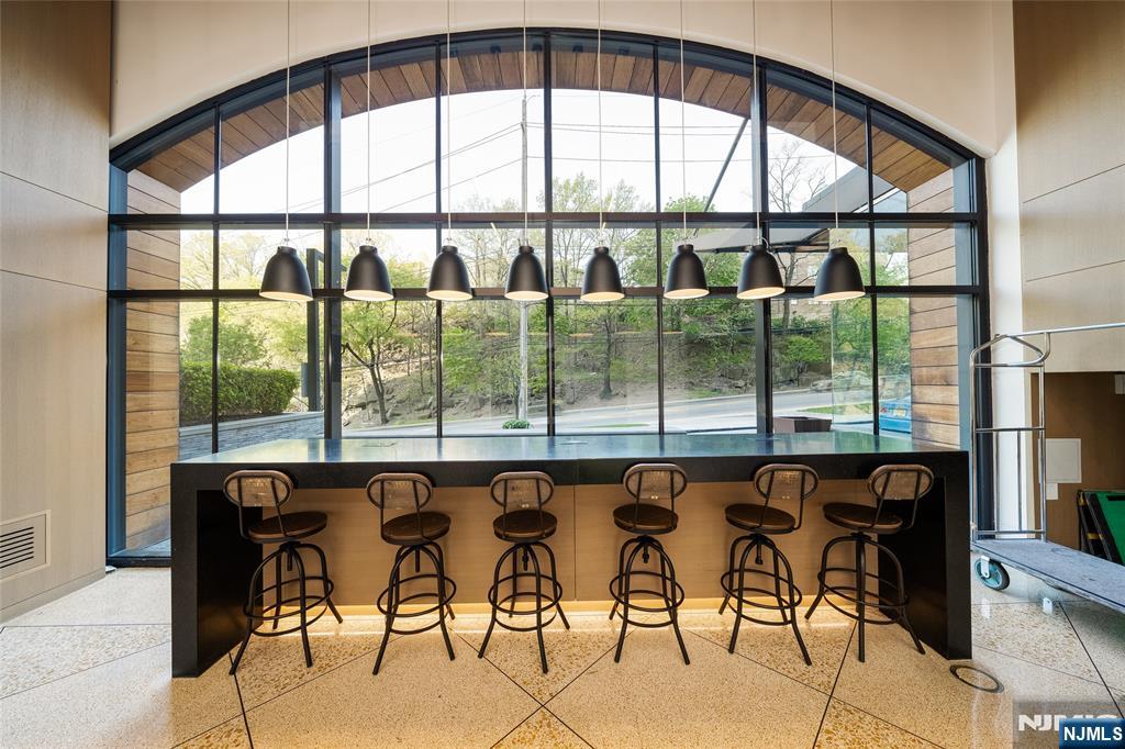 250 Gorge Road, Unit 23A Cliffside Park, NJ 07010 - Photo 23 of 41 a view of a floor to ceiling window in an outdoor space