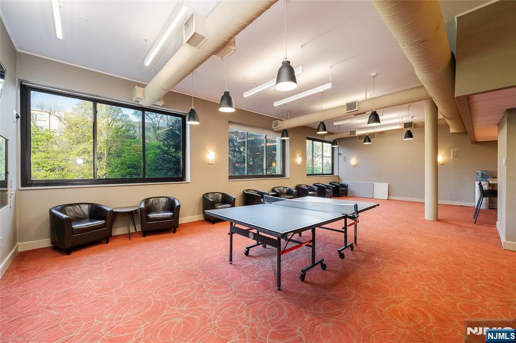 250 Gorge Road, Unit 23A Cliffside Park, NJ 07010 - Photo 25 of 41 a room with furniture and a large window