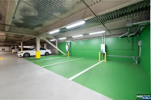 a backyard with a table and chairs