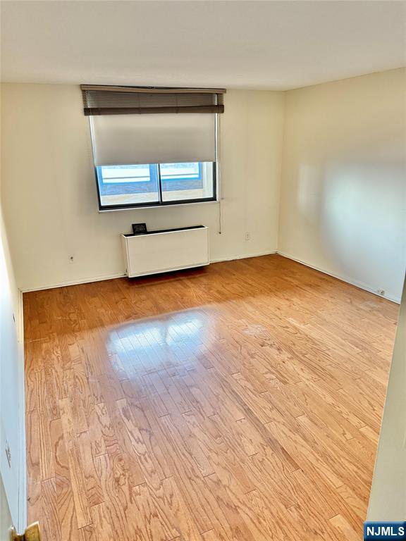 250 Gorge Road, Unit 23A Cliffside Park, NJ 07010 - Photo 7 of 41 a view of empty room with wooden floor and fan