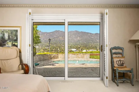 a bathroom with a sink vanity and mirror