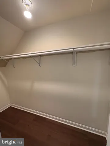 a view of an empty walk in closet