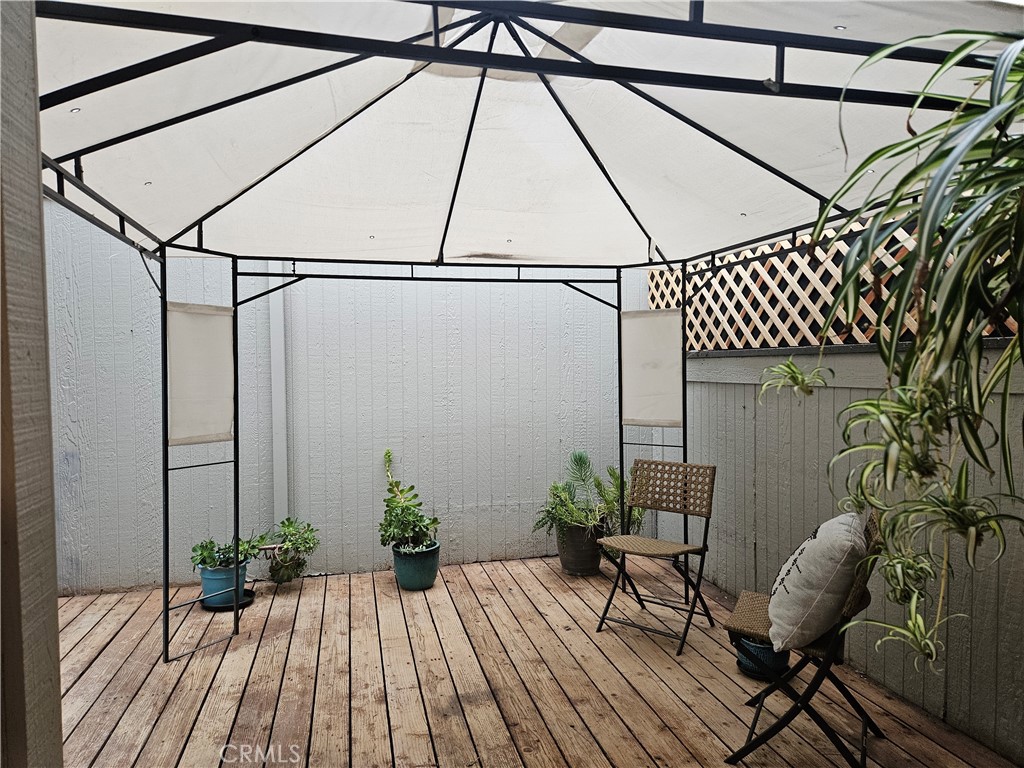 6509 Twin Cir Lane, Unit 7 Simi Valley, CA 93063 - Photo 17 of 22 outdoor patio connecting to garage