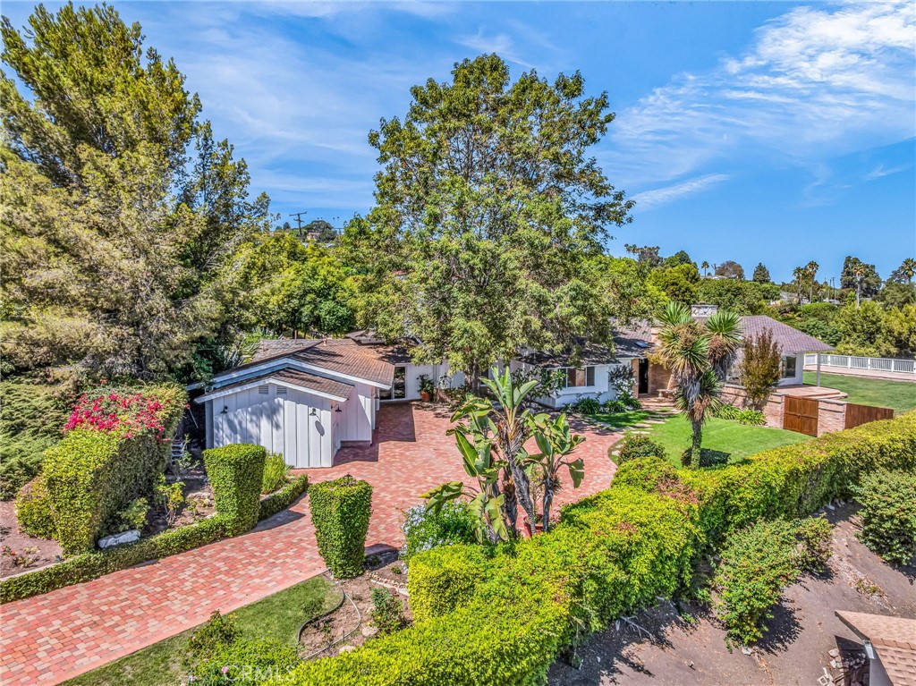 2417 Sunnyside Ridge Road Rancho Palos Verdes, CA 90275 - Photo 1 of 1 a view of a house with a yard and garden
