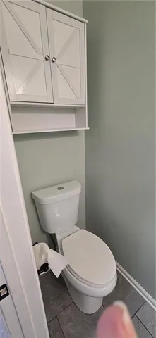 a bathroom with a toilet
