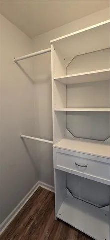 a view of an empty walk in closet