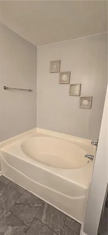 a bathroom with a bathtub