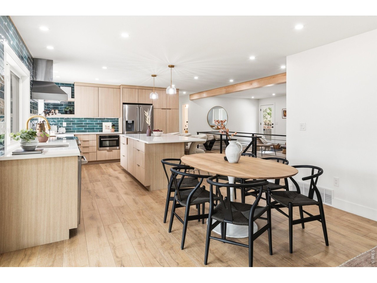 7750 Durham Way Boulder, CO 80301 - Photo 12 of 32 a kitchen with a table and chairs in it