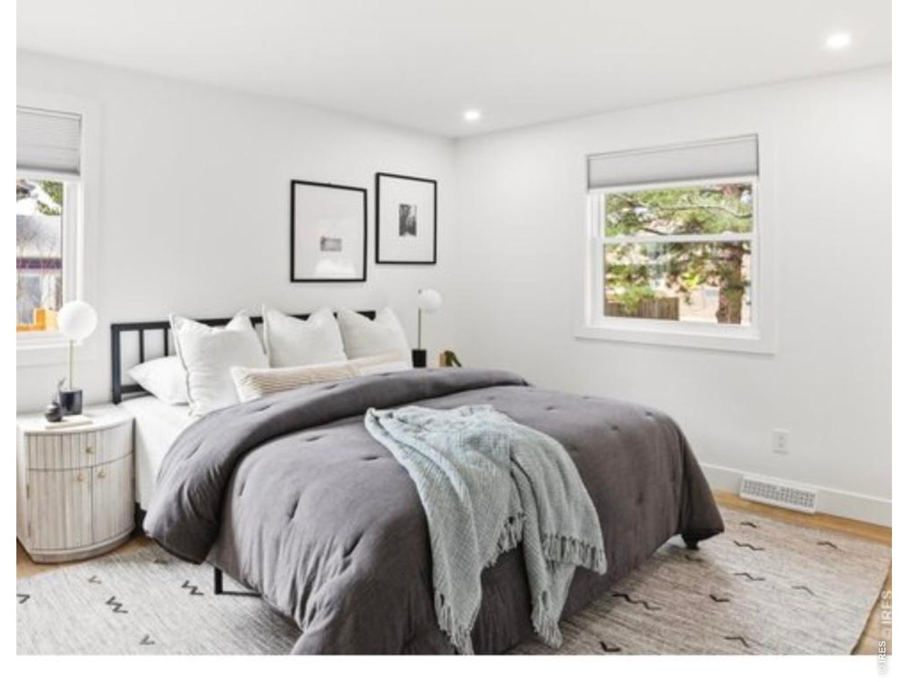 7750 Durham Way Boulder, CO 80301 - Photo 16 of 32 a bedroom with a bed and a painting on the wall