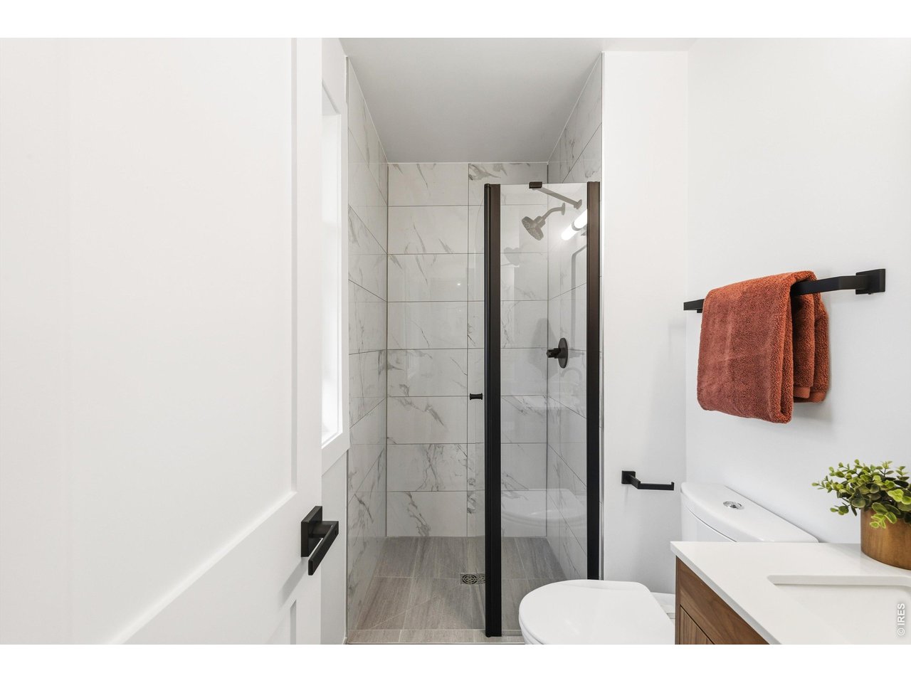 7750 Durham Way Boulder, CO 80301 - Photo 18 of 32 a bathroom with a sink and a shower