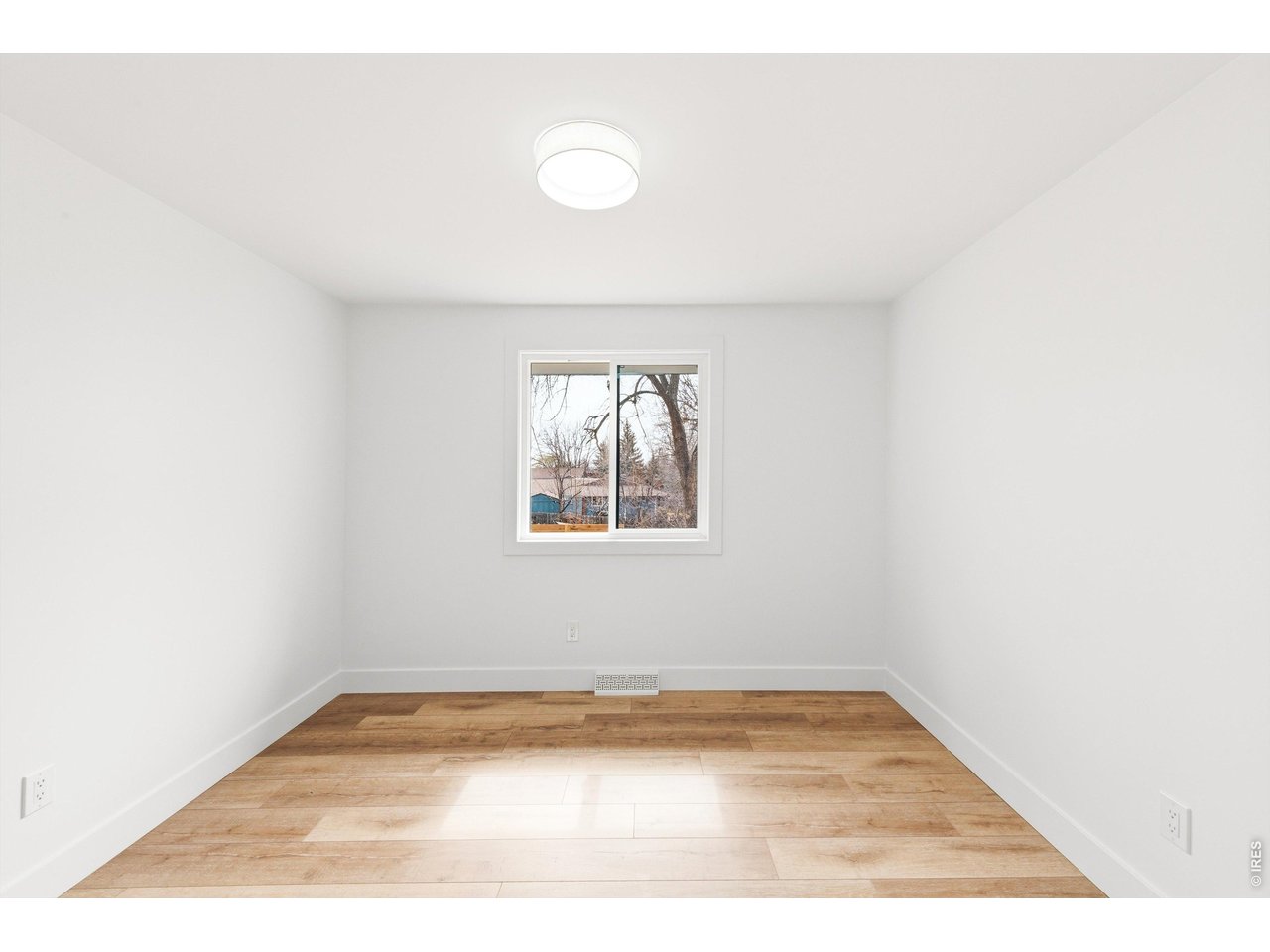 7750 Durham Way Boulder, CO 80301 - Photo 20 of 32 a view of empty room with wooden floor