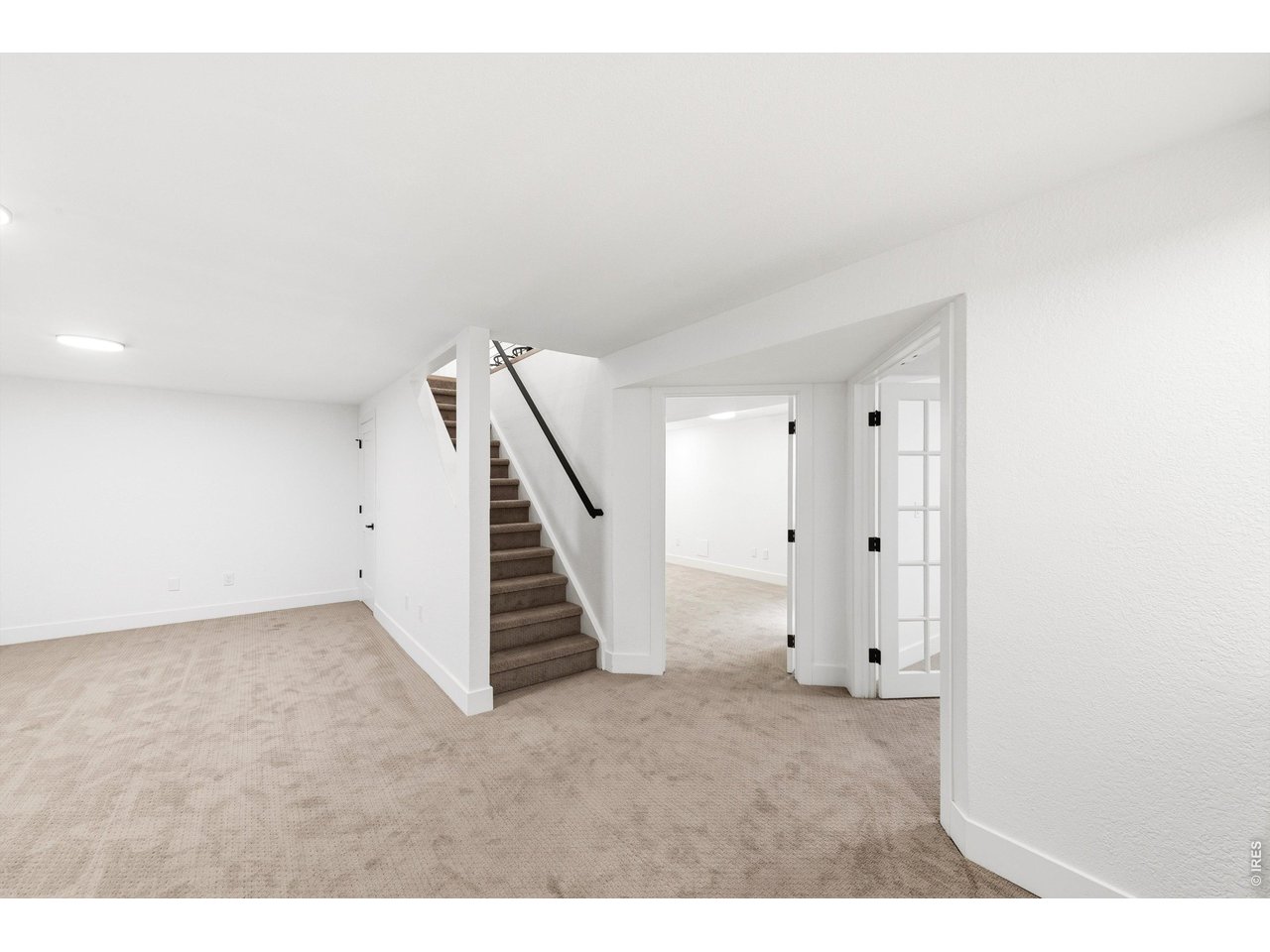 7750 Durham Way Boulder, CO 80301 - Photo 21 of 32 a view of an empty room with stairs