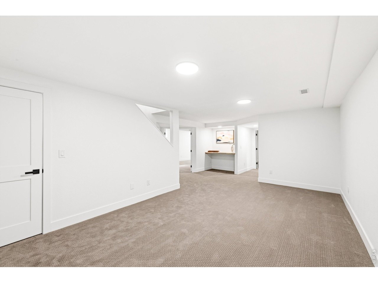 7750 Durham Way Boulder, CO 80301 - Photo 22 of 32 a view of a cabinet and an empty room