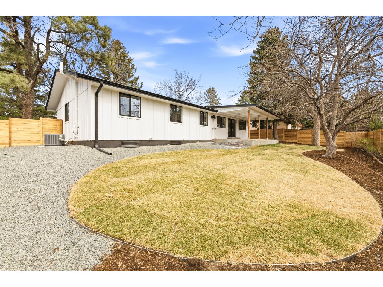 7750 Durham Way Boulder, CO 80301 - Photo 29 of 32 a view of a house with a backyard