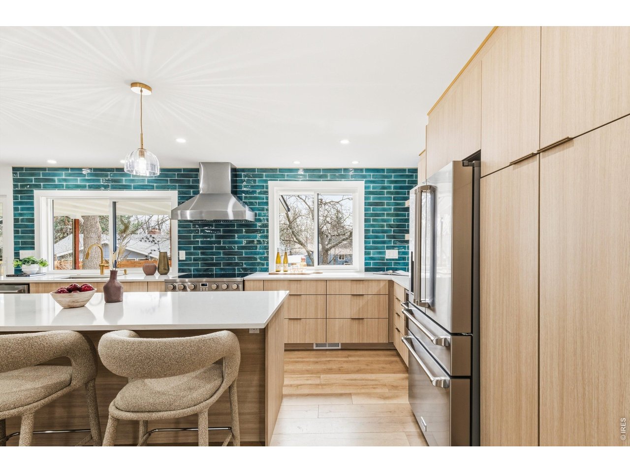 7750 Durham Way Boulder, CO 80301 - Photo 8 of 32 a living room with furniture a large window and kitchen view