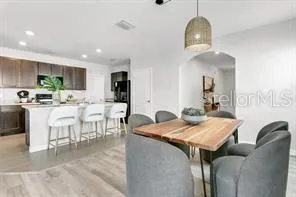 a view of a dining room with furniture
