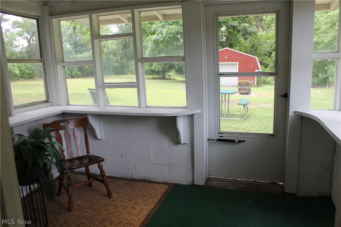 14900 Turney Road Maple Heights, OH 44137 - Photo 33 of 43 Walk out basement sunroom.