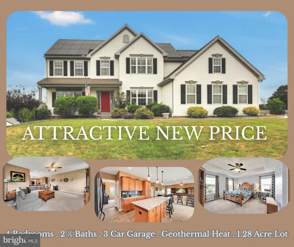 a front view of a house with a garden and yard