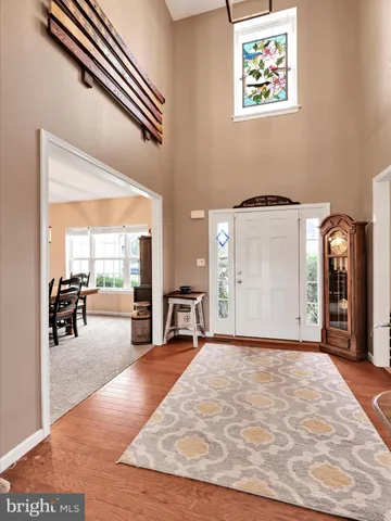 a open kitchen with a table and chairs in it