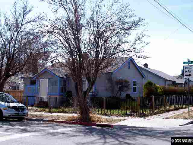 1065 Locust Street Reno, NV 89502 - Photo 1 of 6 a front view of a house with a yard
