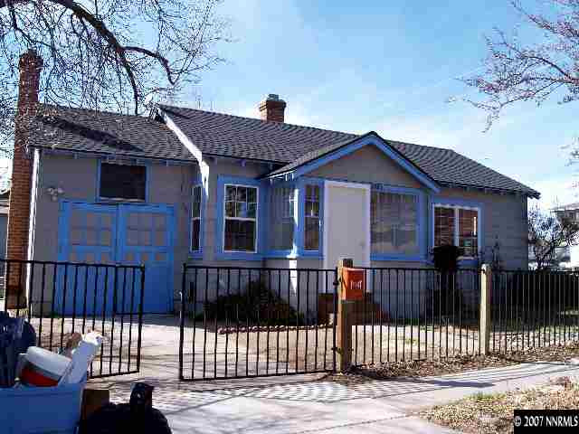 1065 Locust Street Reno, NV 89502 - Photo 6 of 6 a front view of a house with a yard