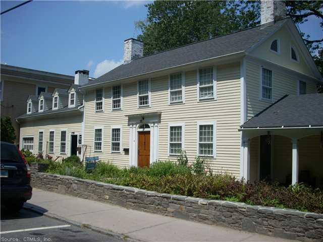 43 Main Street Chester, CT 06412 - Photo 1 of 1 a front view of a house with garden