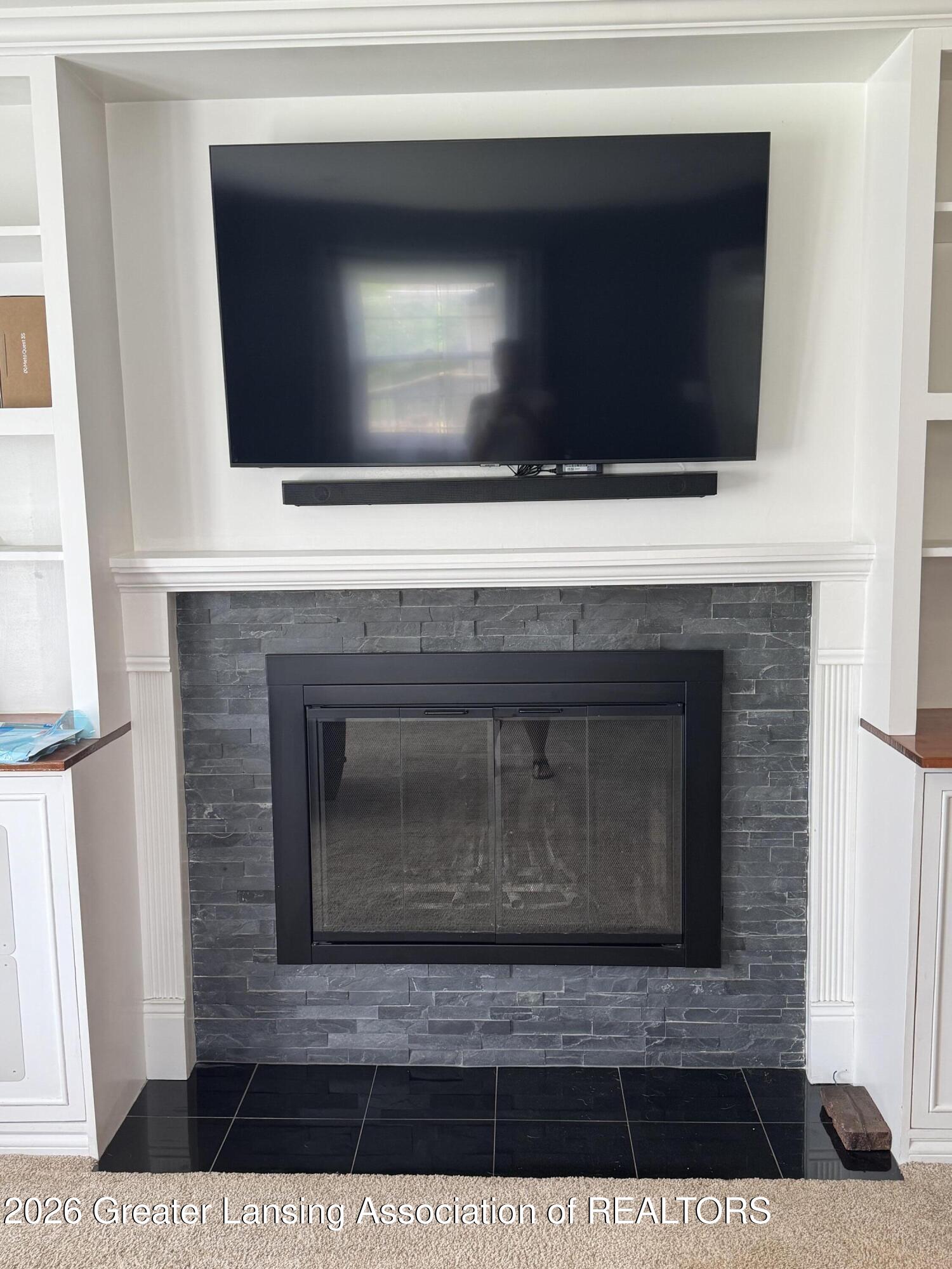 4901 Alpha Street Lansing, MI 48910 - Photo 7 of 34 Fireplace