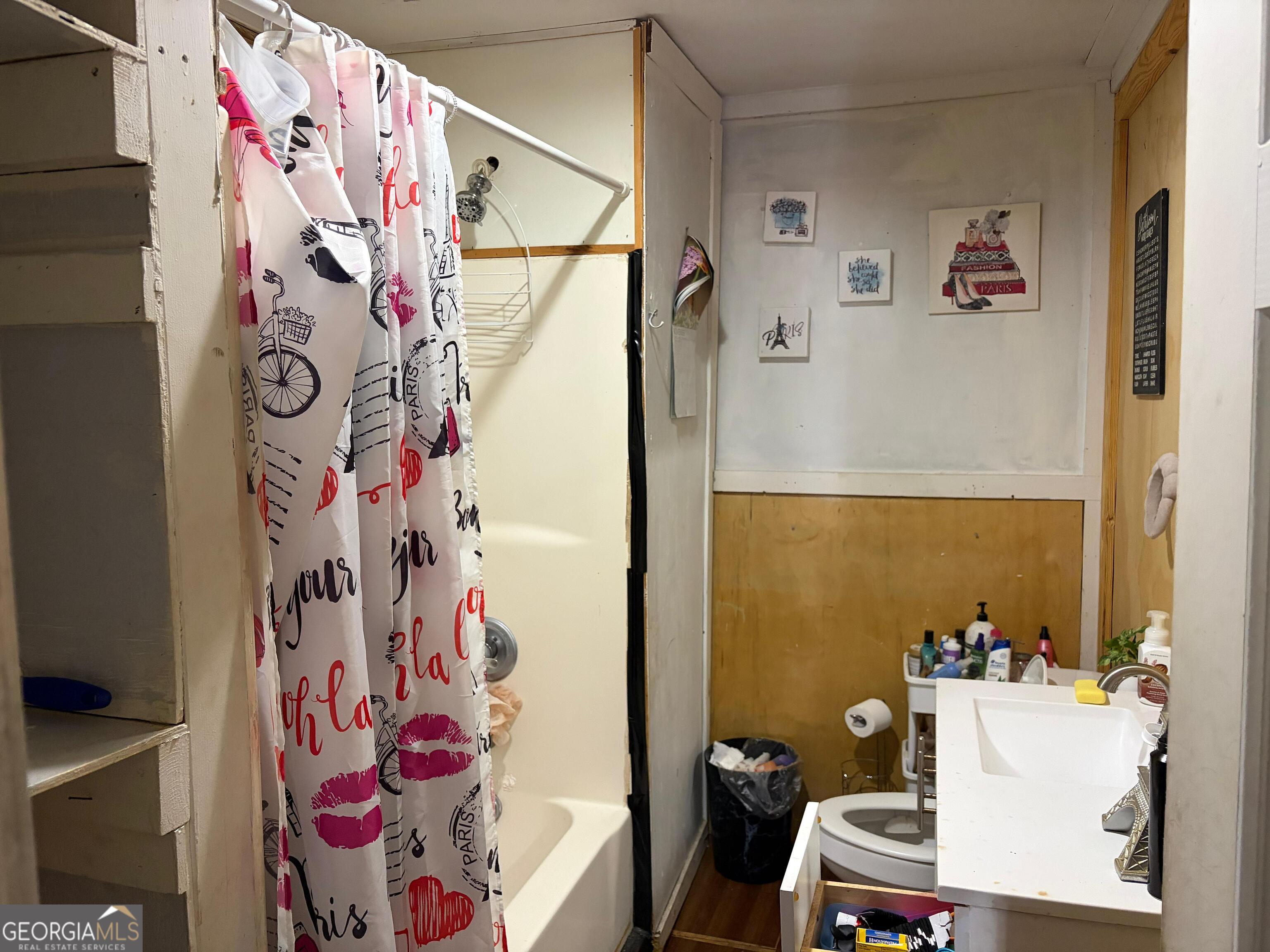 115 Rhodes Road Columbia, NC 27925 - Photo 11 of 20 a bathroom with a sink and a mirror