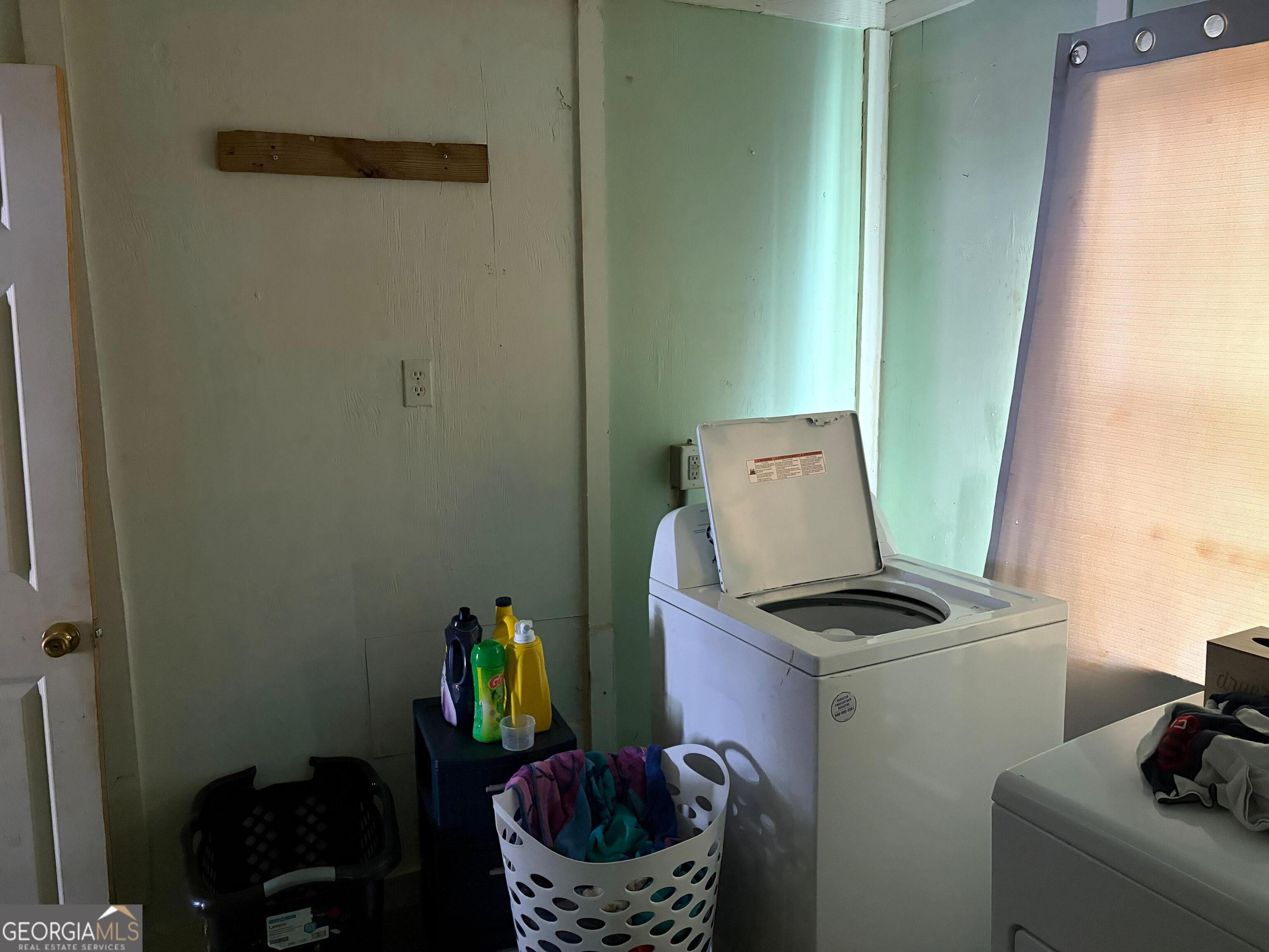 115 Rhodes Road Columbia, NC 27925 - Photo 9 of 20 a room with storage and utility