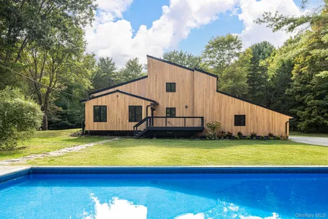 a view of a swimming pool with an outdoor space