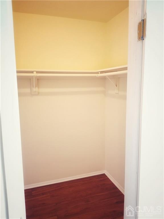 8503 Hana Road Edison, NJ 08817 - Photo 11 of 18 a view of small space with racks on the wall