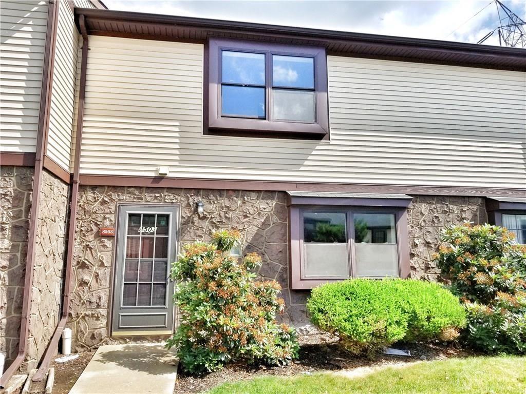 8503 Hana Road Edison, NJ 08817 - Photo 2 of 18 a front view of a house with garden