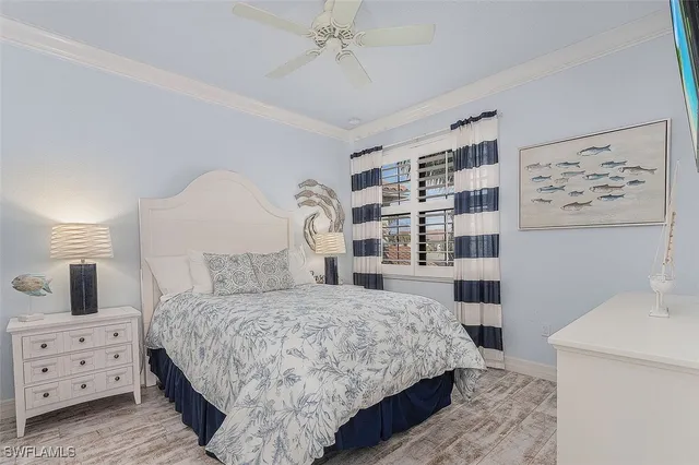 a bedroom with a bed and a cabinets