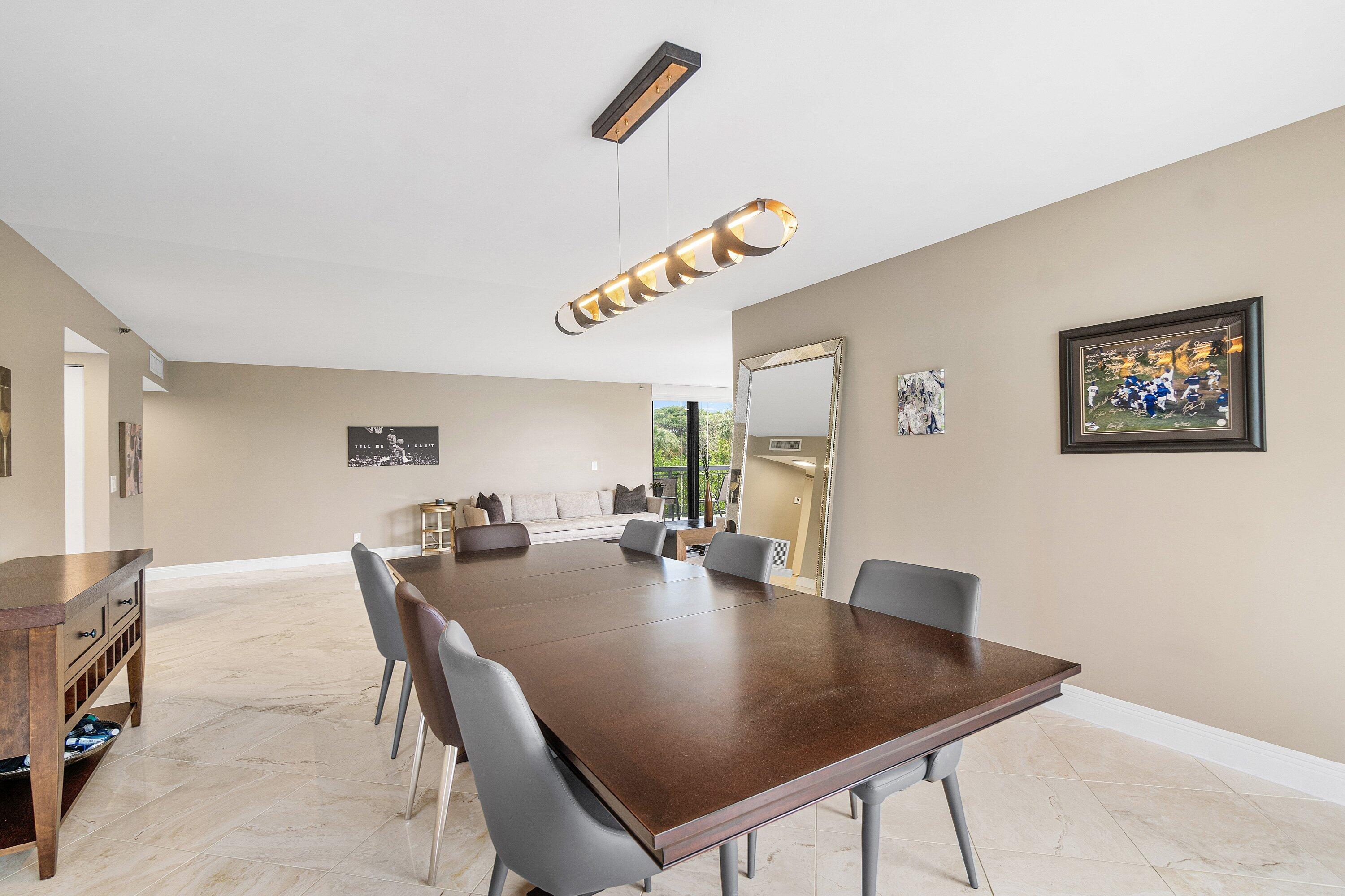 2001 North Ocean Boulevard, Unit 305 Boca Raton, FL 33431 - Photo 17 of 61 a view of a dining room with furniture