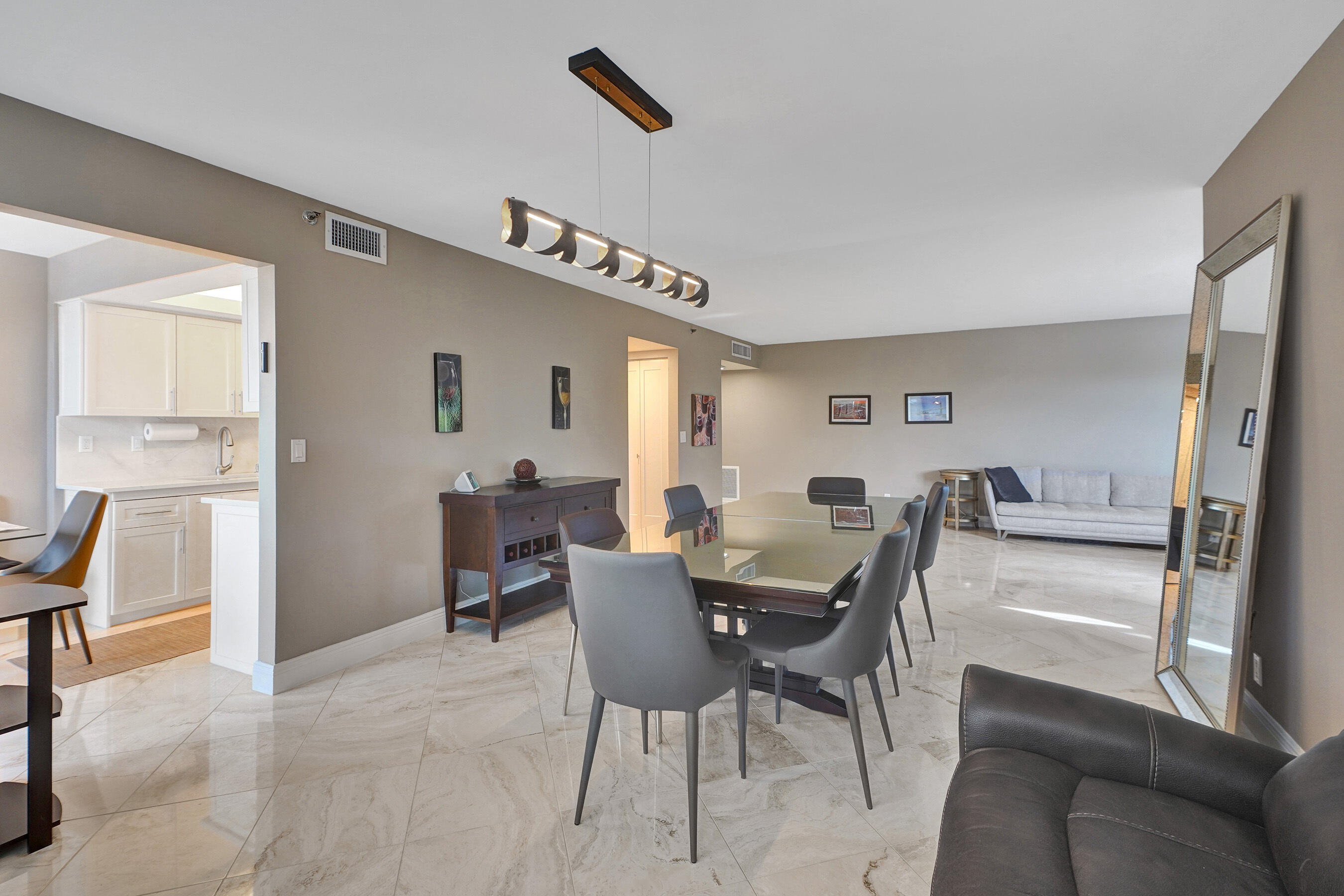 2001 North Ocean Boulevard, Unit 305 Boca Raton, FL 33431 - Photo 18 of 61 a dining room with furniture and window