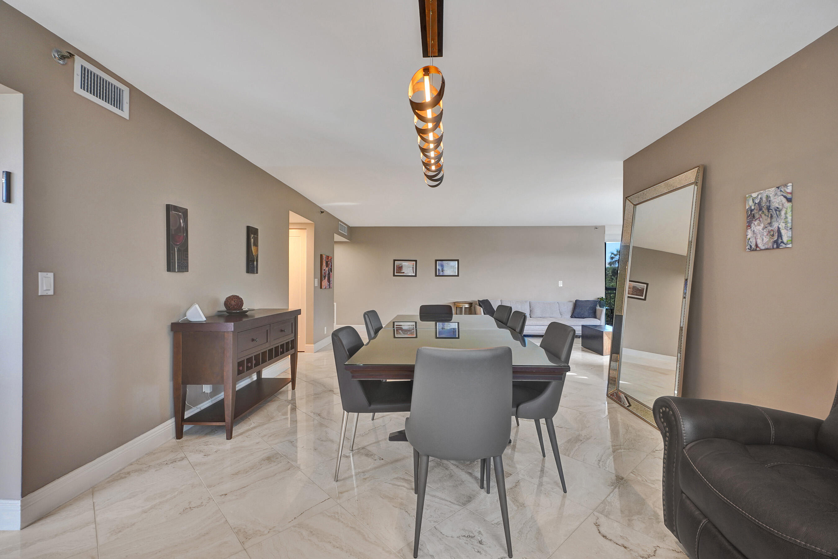 2001 North Ocean Boulevard, Unit 305 Boca Raton, FL 33431 - Photo 19 of 61 a view of a dining room with furniture