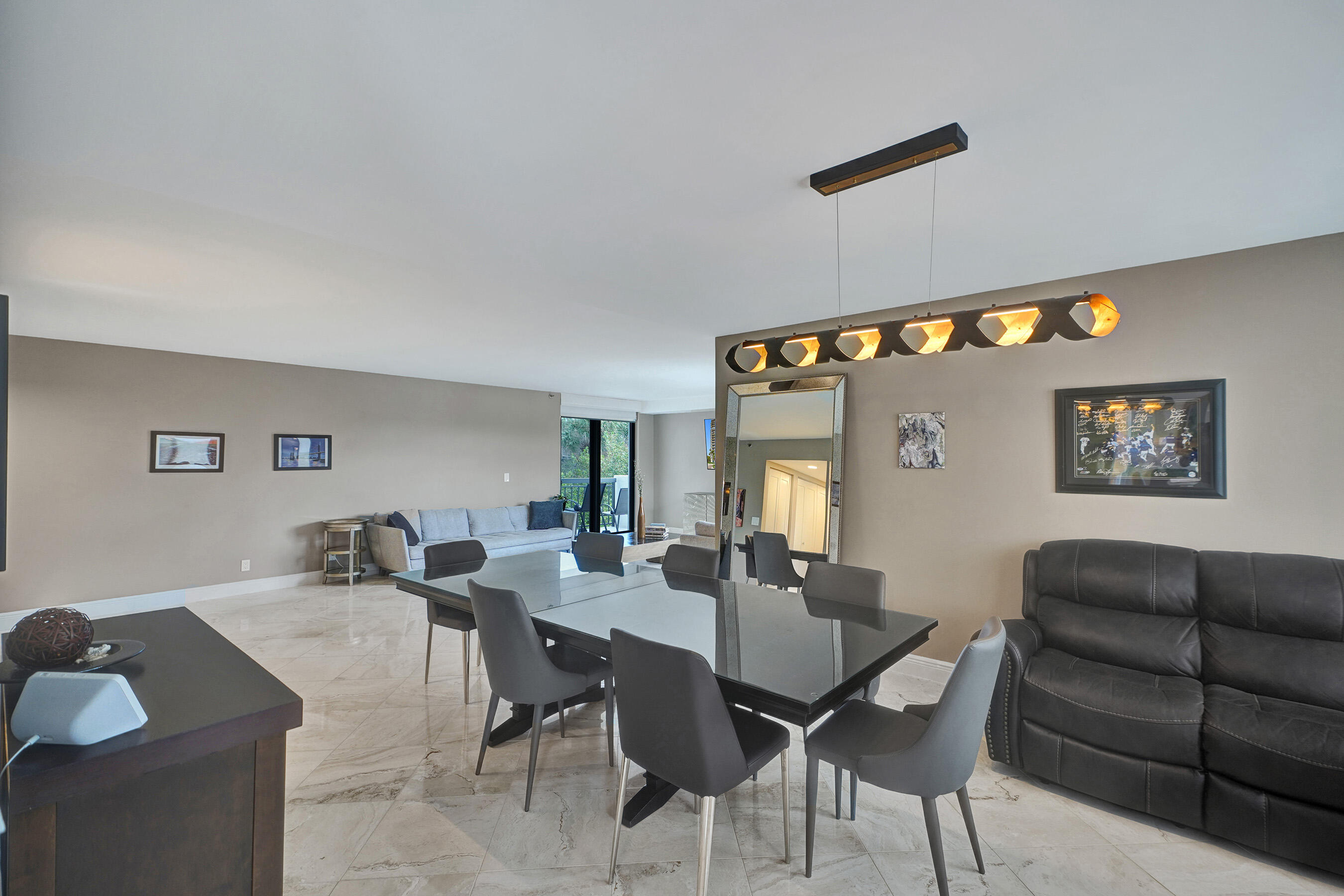 2001 North Ocean Boulevard, Unit 305 Boca Raton, FL 33431 - Photo 23 of 61 a view of a dining room with furniture