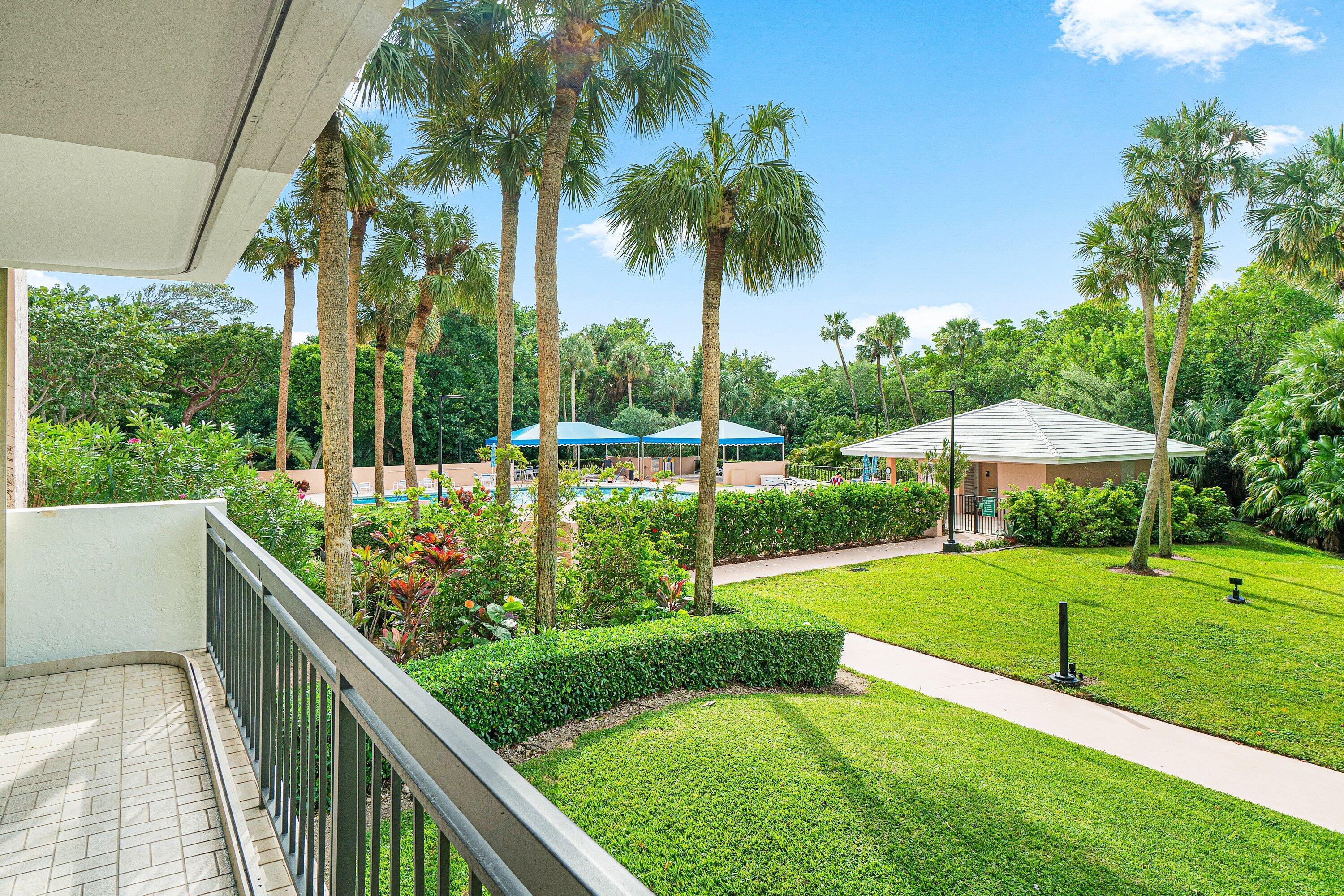 2001 North Ocean Boulevard, Unit 305 Boca Raton, FL 33431 - Photo 31 of 61 a view of a garden with palm trees