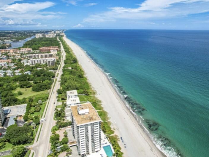 2001 North Ocean Boulevard, Unit 305 Boca Raton, FL 33431 - Photo 57 of 61 a view of a yard with an umbrella