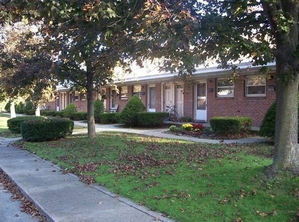 a house view with a garden space