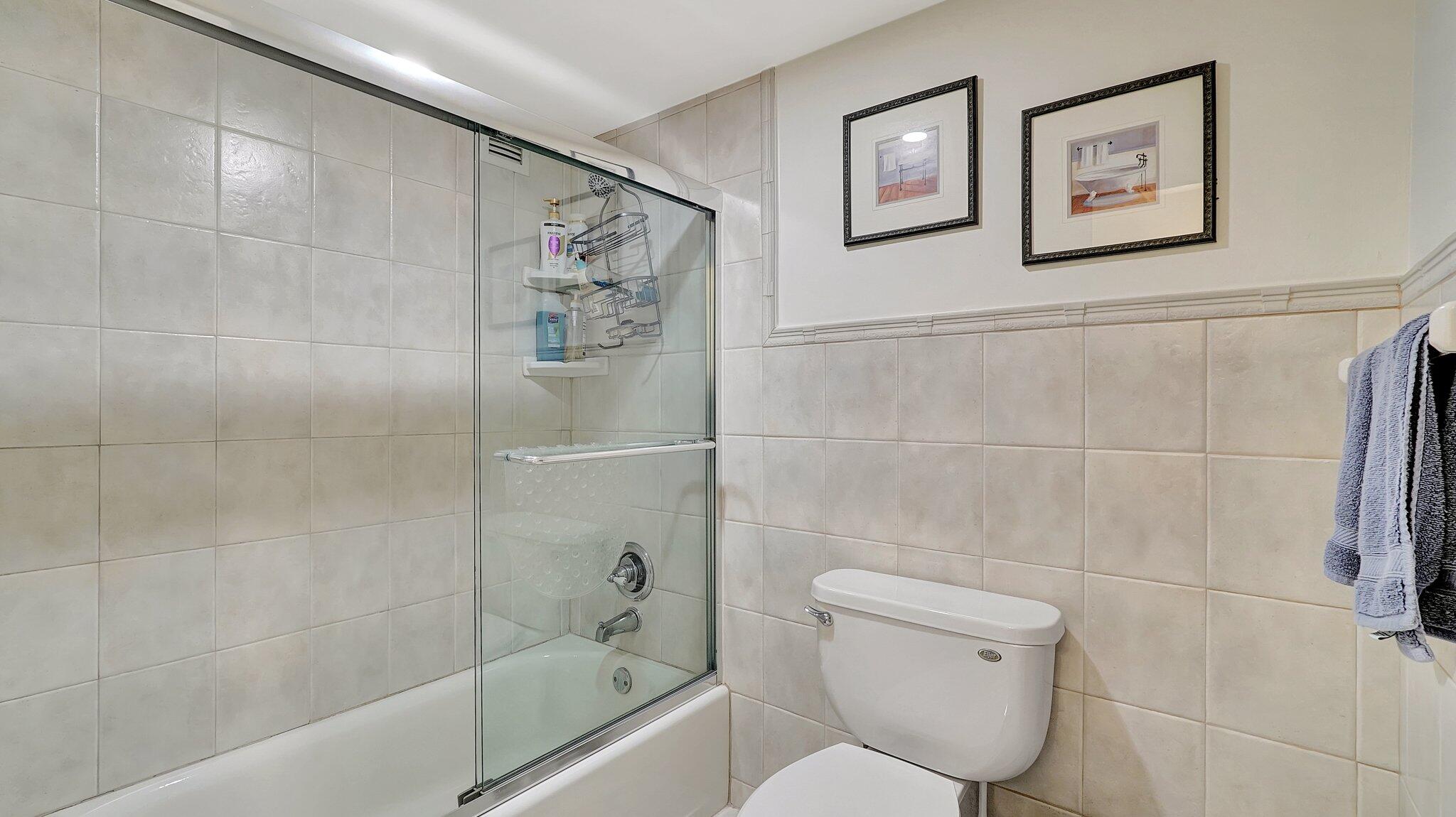 1825 South Ocean Drive, Unit 908 Hallandale Beach, FL 33009 - Photo 18 of 20 a bathroom with a toilet and a shower