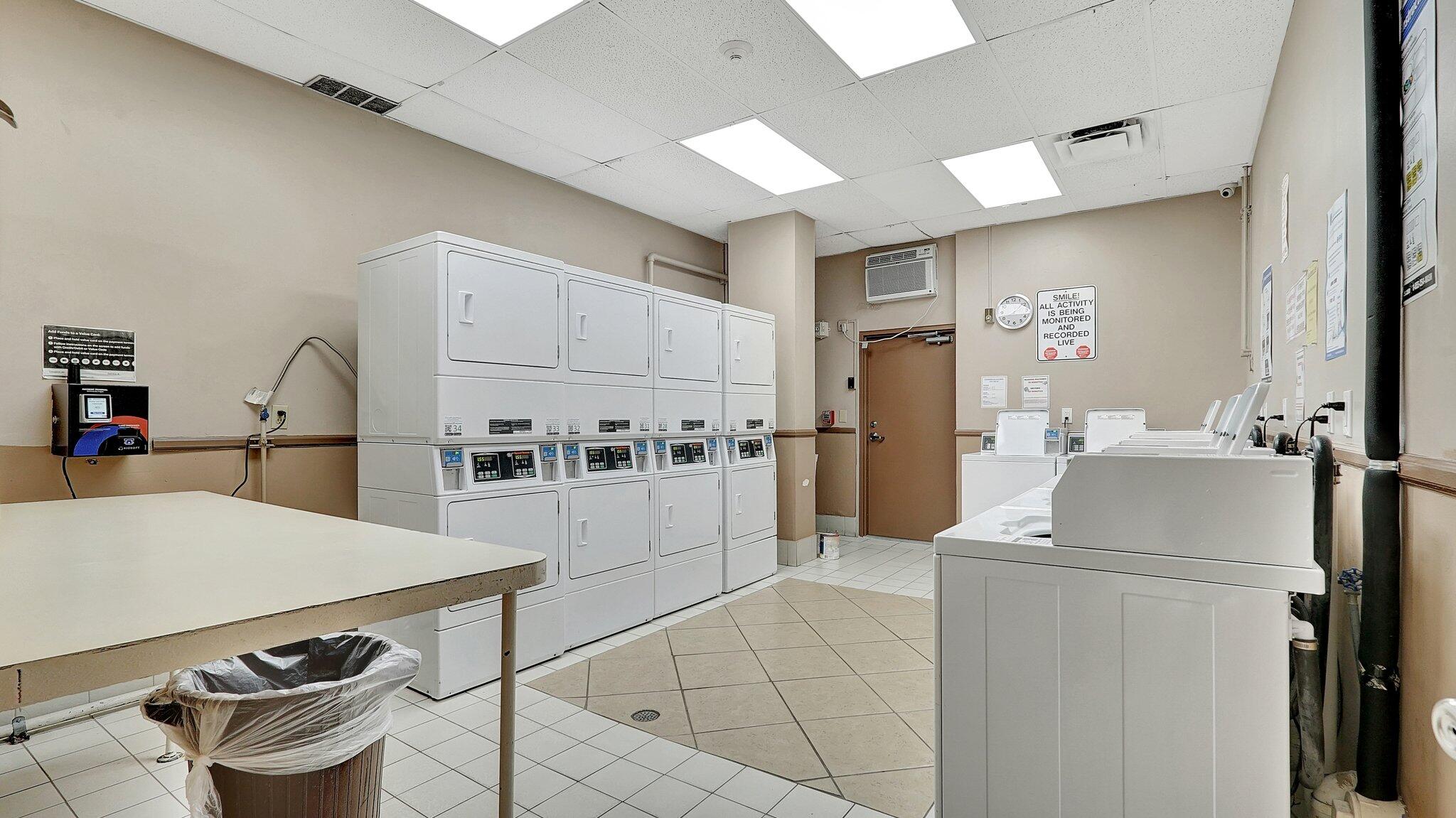 1825 South Ocean Drive, Unit 908 Hallandale Beach, FL 33009 - Photo 4 of 20 a kitchen with a sink appliances and cabinets