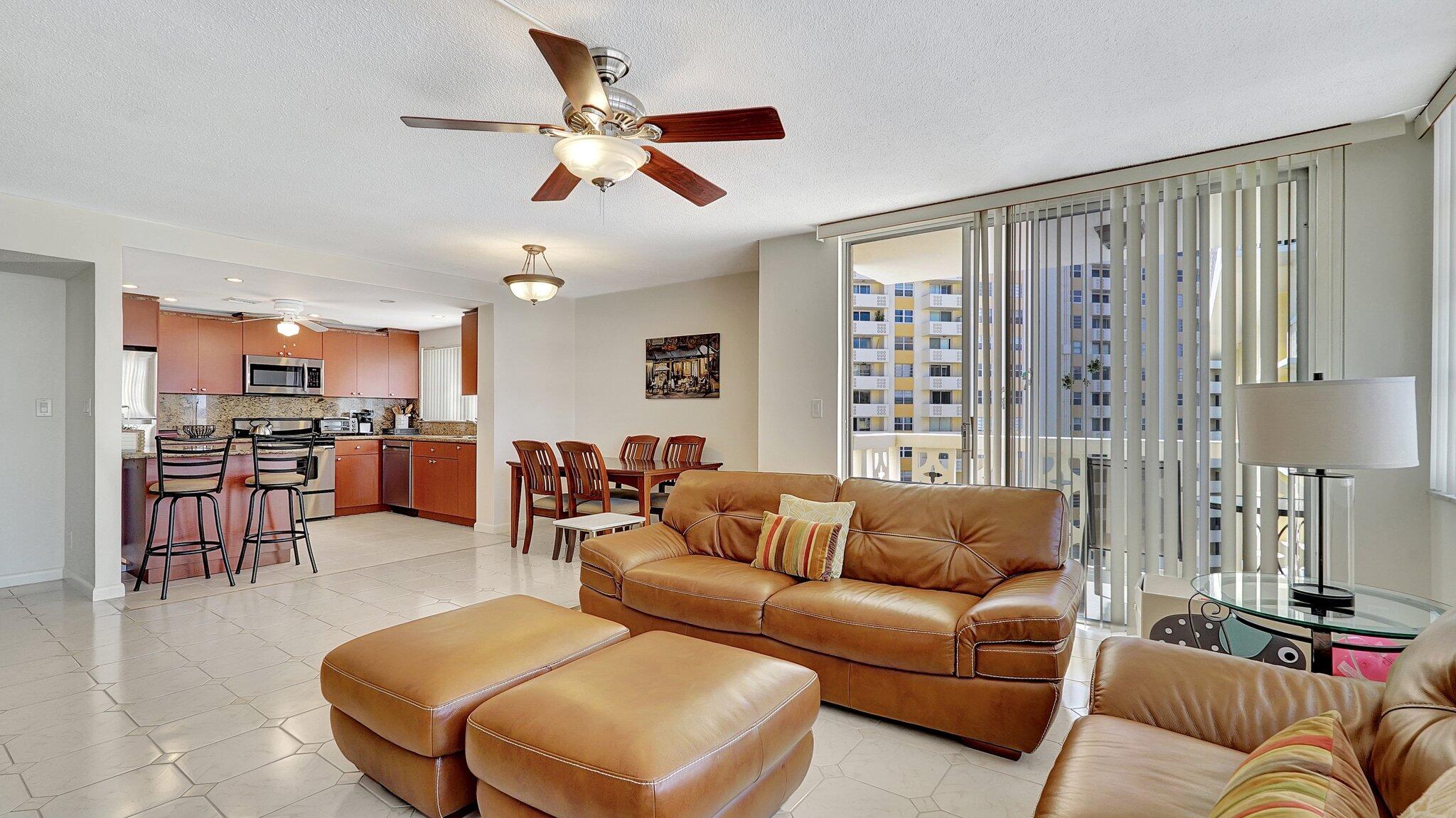 1825 South Ocean Drive, Unit 908 Hallandale Beach, FL 33009 - Photo 7 of 20 a living room with furniture kitchen view and a large window