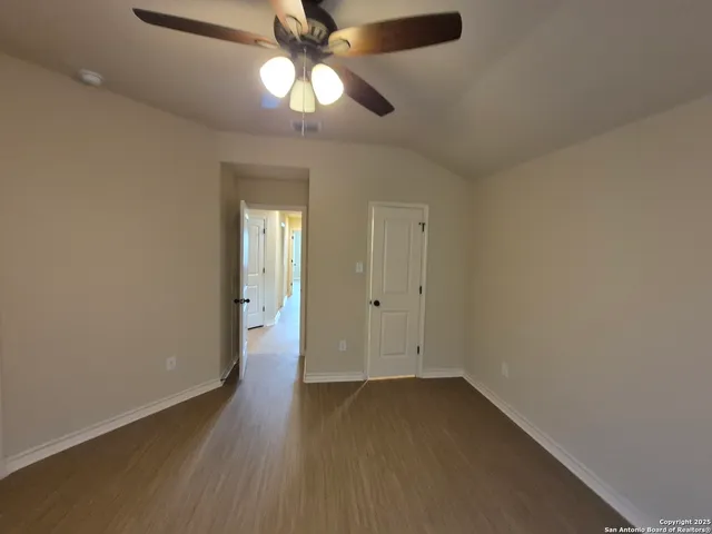 a bathroom with a toilet and a bathtub