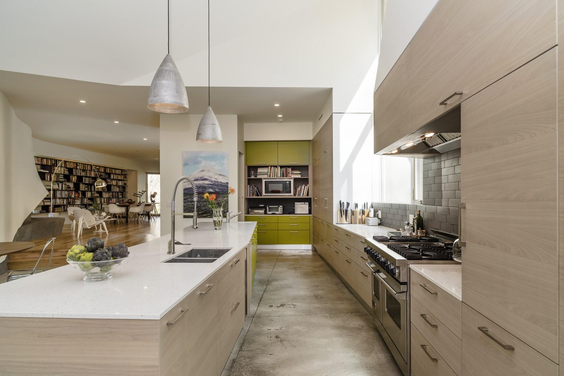 364 Hollow Tree Ridge Road Darien, CT 06820 - Photo 12 of 31 a kitchen with stainless steel appliances kitchen island granite countertop a sink and cabinets