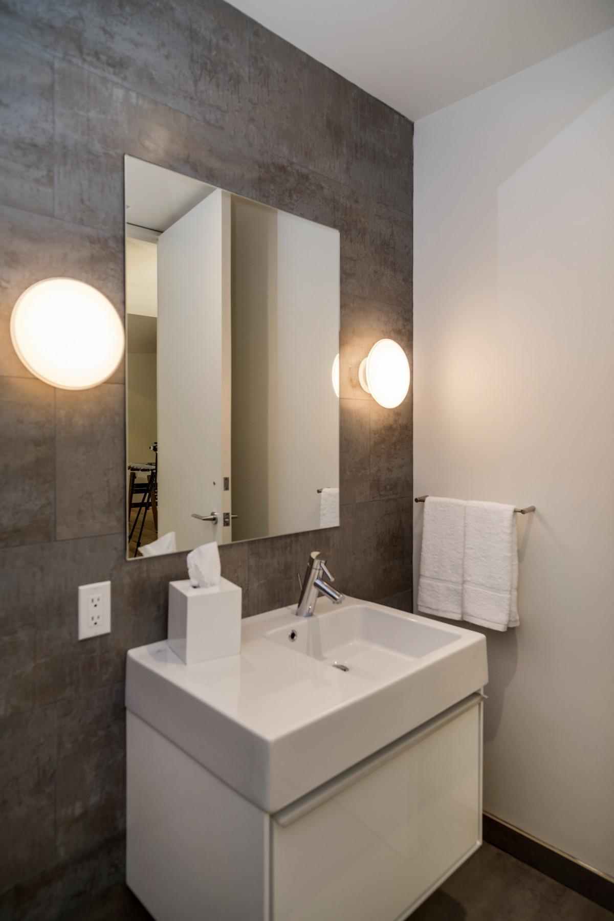 364 Hollow Tree Ridge Road Darien, CT 06820 - Photo 16 of 31 a bathroom with a sink and a mirror