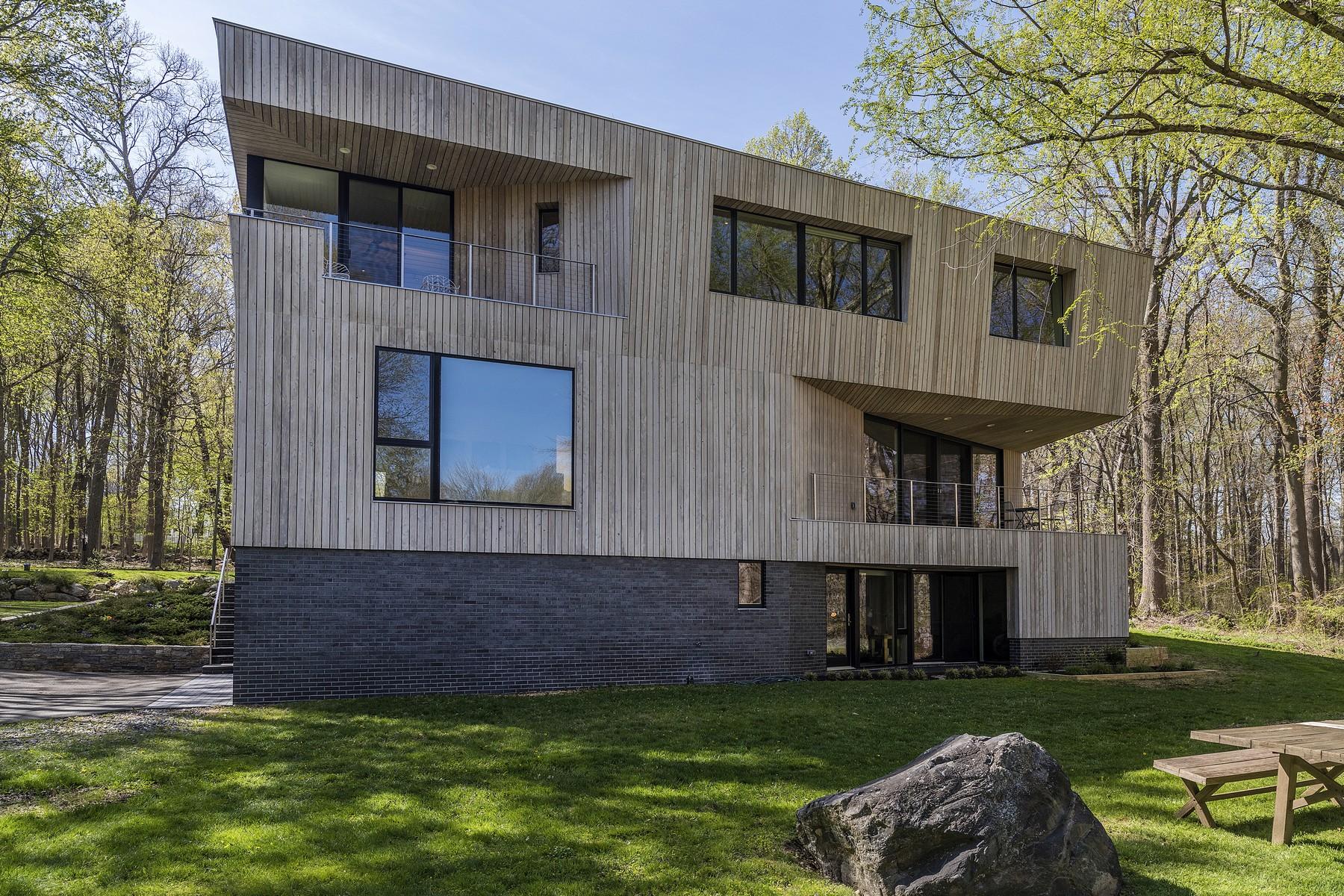 364 Hollow Tree Ridge Road Darien, CT 06820 - Photo 28 of 31 a view of a house with a yard and a large tree