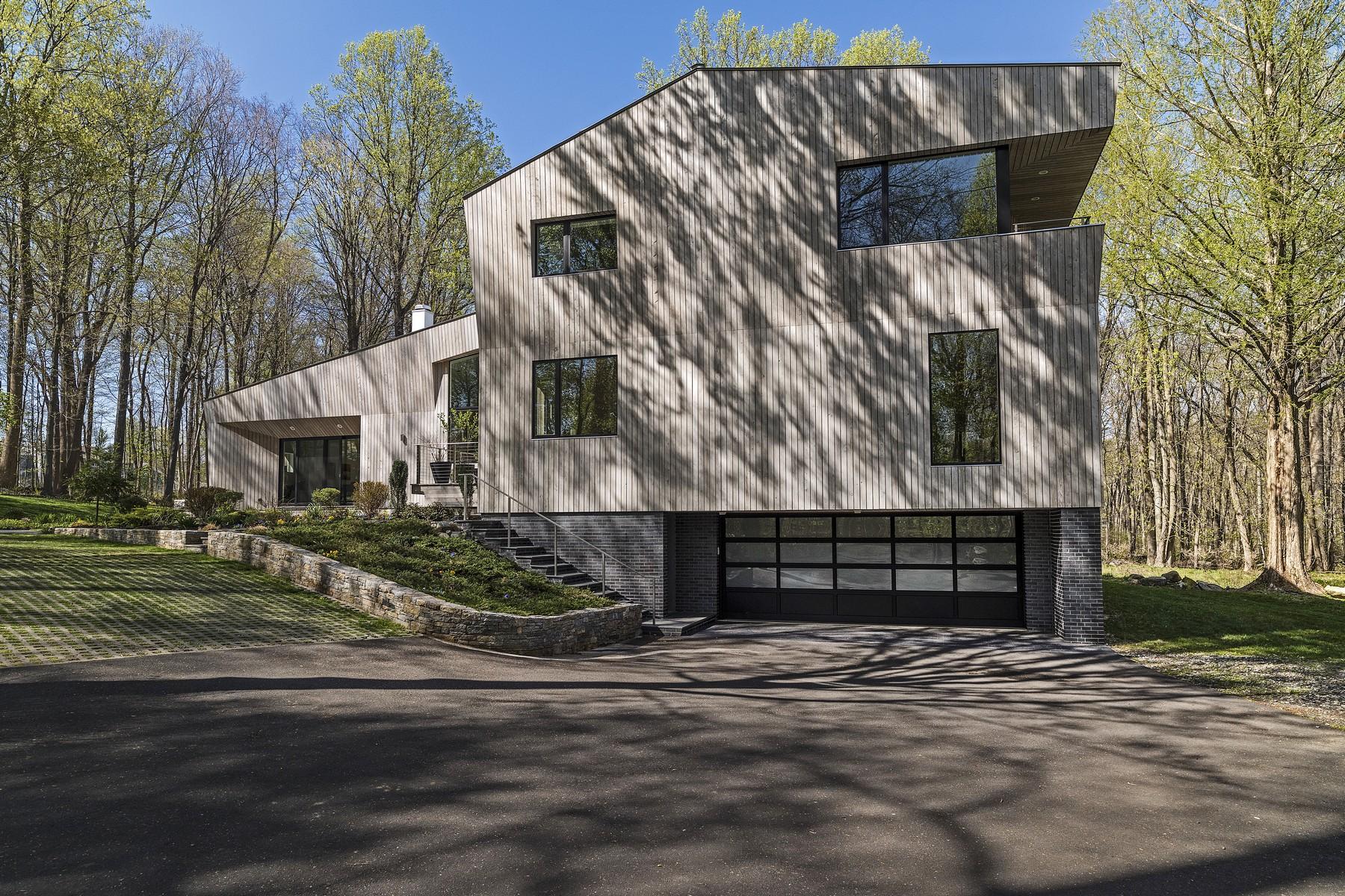 364 Hollow Tree Ridge Road Darien, CT 06820 - Photo 30 of 31 a front view of a house with a yard