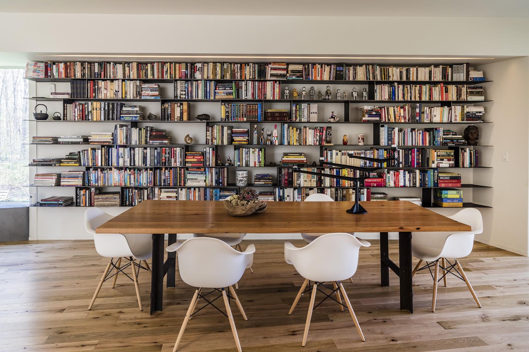 364 Hollow Tree Ridge Road Darien, CT 06820 - Photo 10 of 31 a view of a dining room with furniture and wooden floor